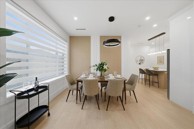 Custom home dining room with modern lighting